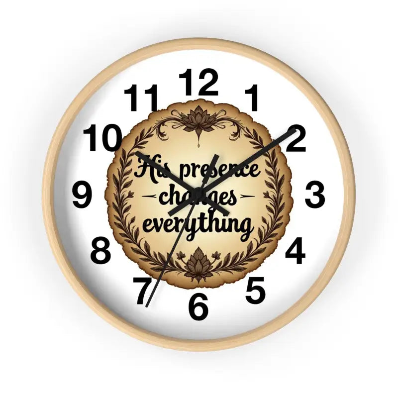 Round Wall Clock with His Presence Changes Everything Message displayed on a wall