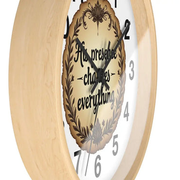 Round Wall Clock with His Presence Changes Everything Message elegantly displayed