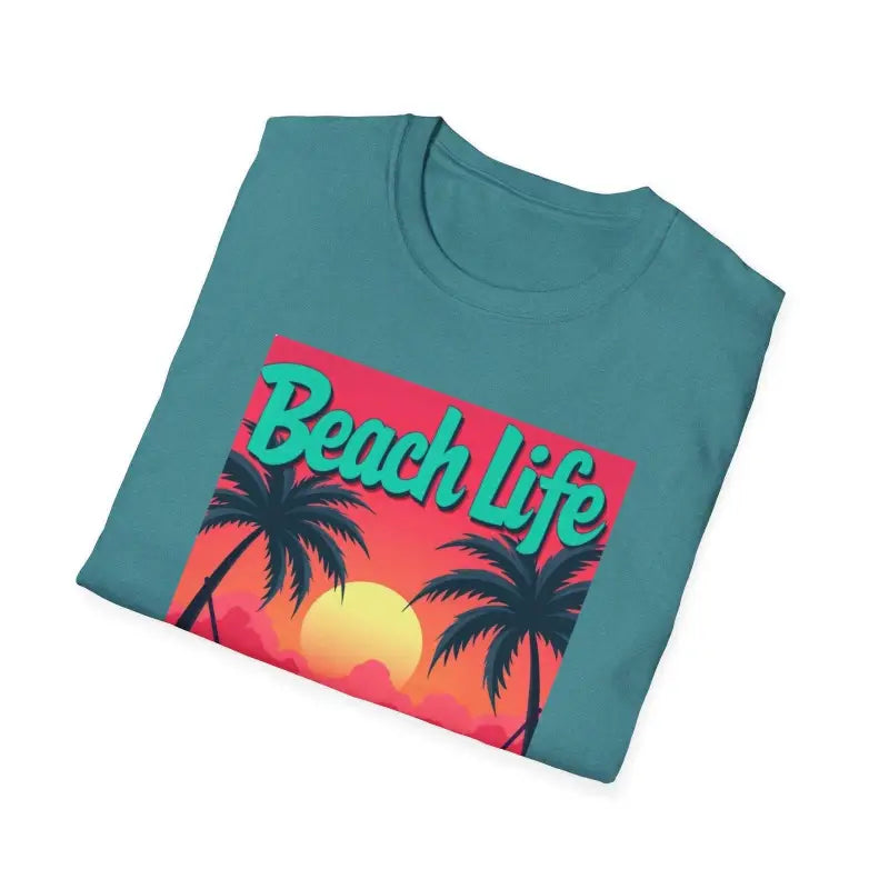 Folded teal t-shirt displayed with Salmon T Shirt featuring a beach scene design