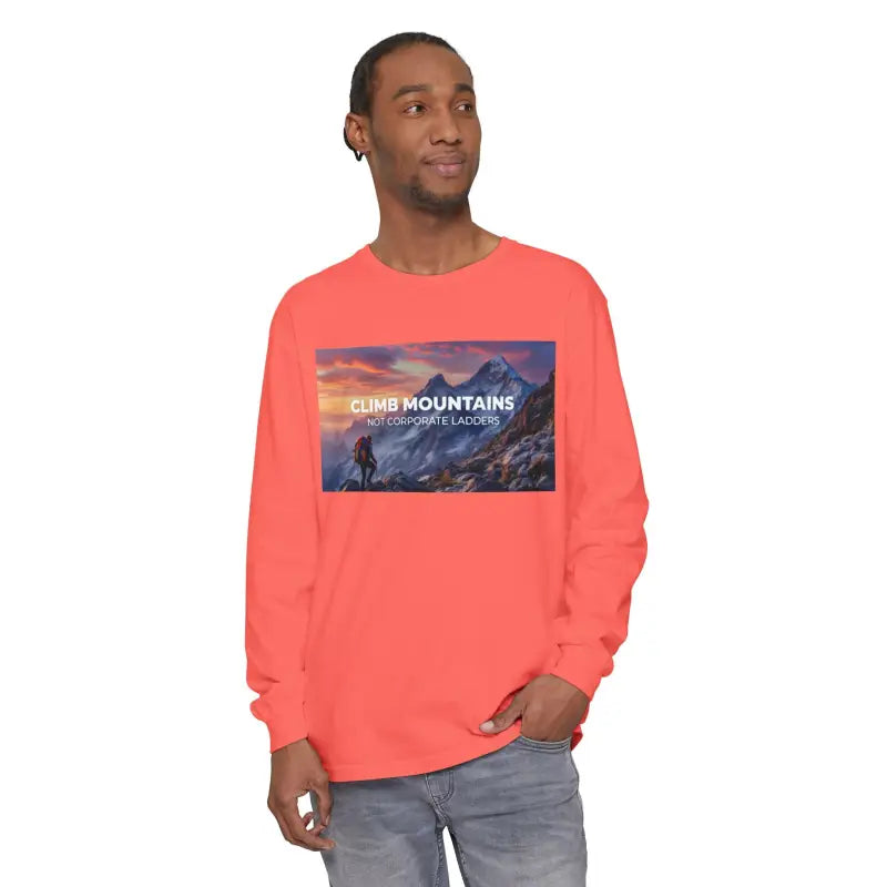 Man wearing coral long-sleeve T shirt with mountain graphic from Scenic Mountain Graphic Long Sleeve T Shirts