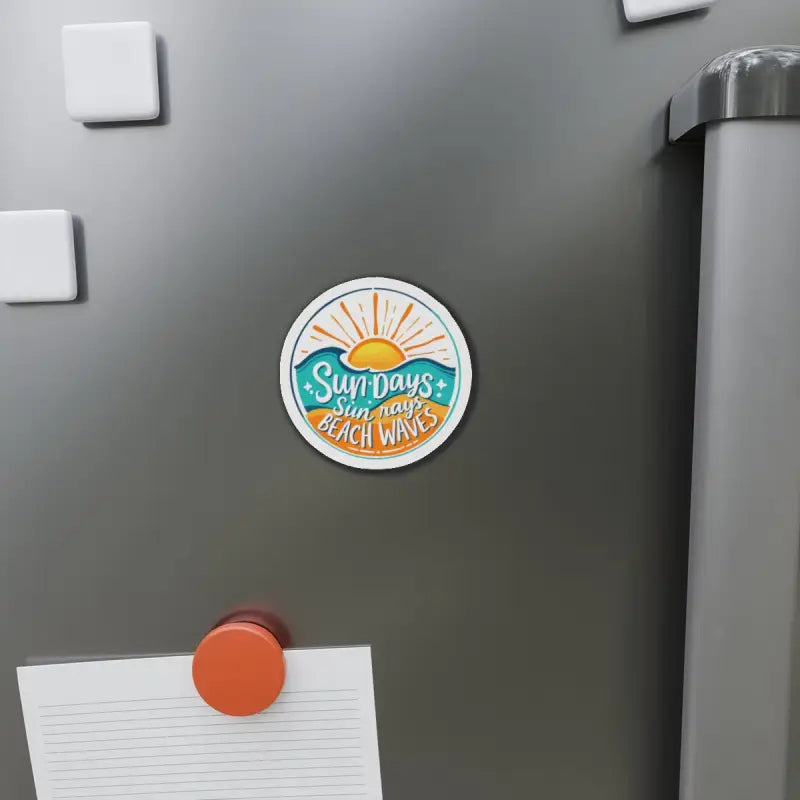 Round magnet with beach-themed sun and wave design for decorative use