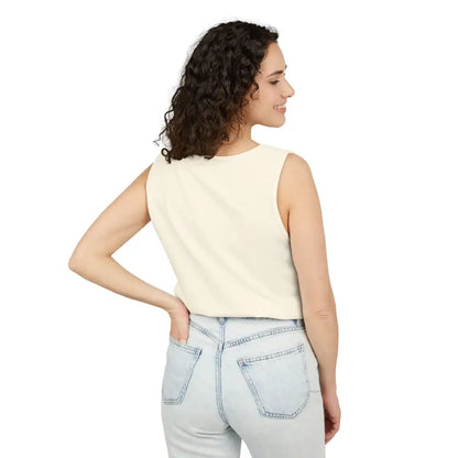 Woman wearing a cream-colored sleeveless crop top and light blue jeans for Sunflower Tank Tops in White Cream and Teal