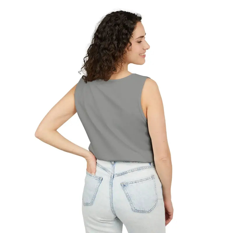 Woman wearing Sunflower Gray Tank Top in light wash jeans showcasing stylish casual attire