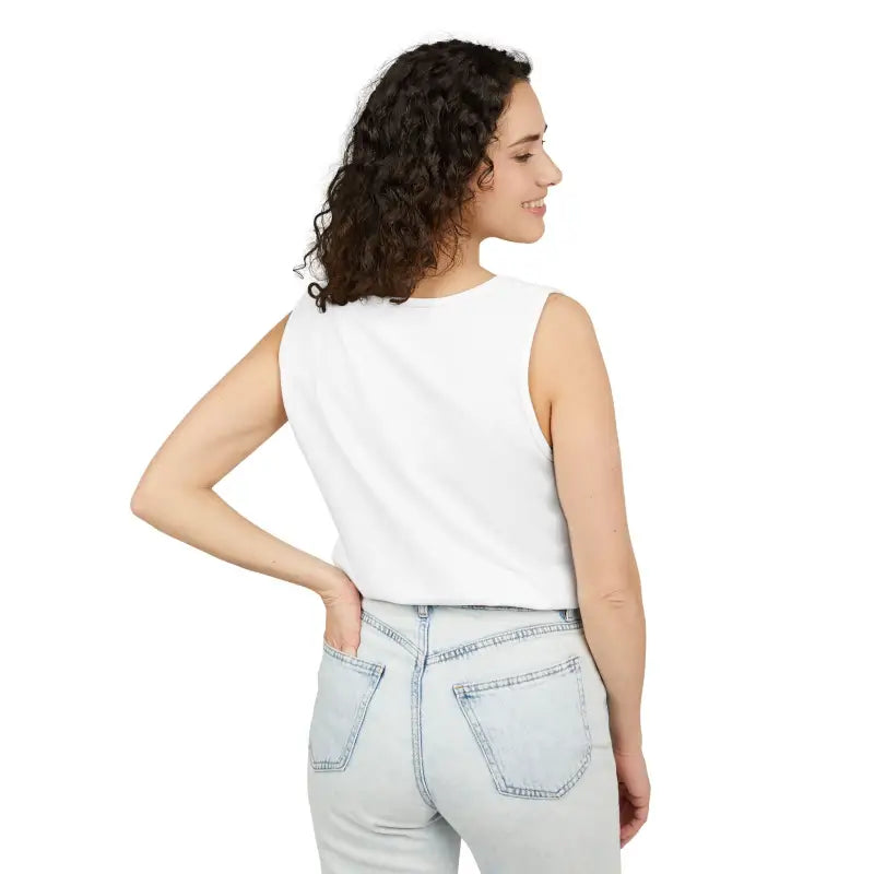 Woman wearing Sunflower Tank Top in white cream paired with light wash jeans