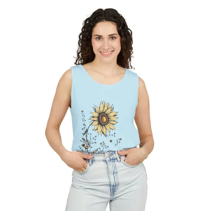 Woman wearing a light blue sunflower tank top from Sunflower Tank Tops collection