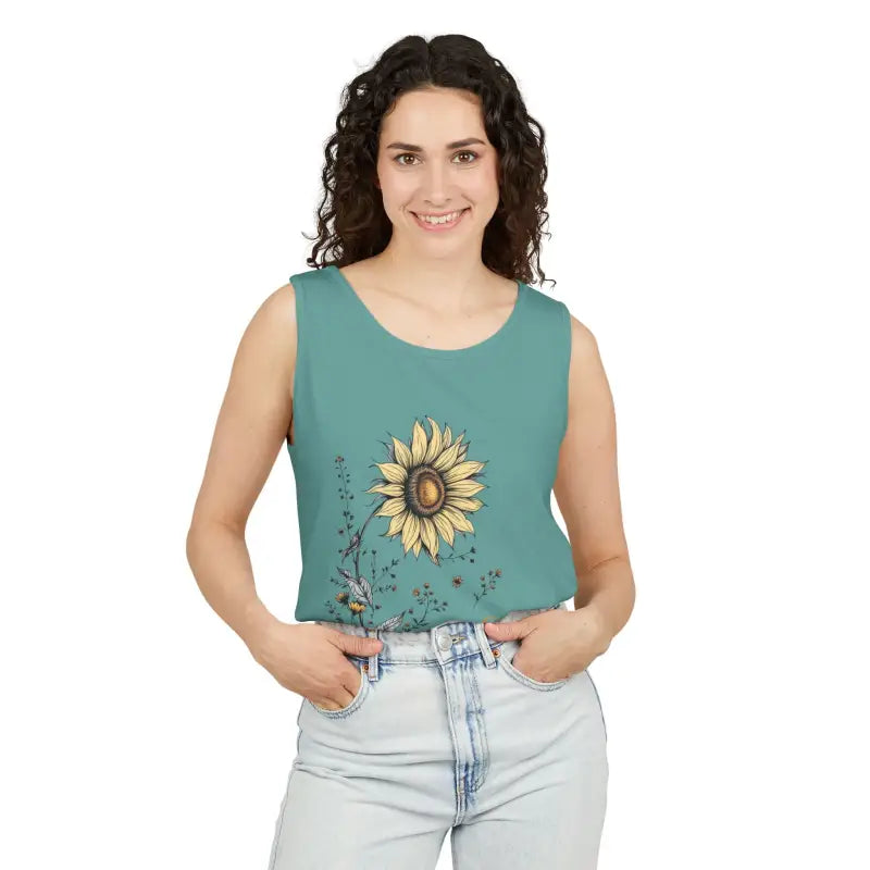 Woman wearing a teal sunflower design tank top from Sunflower Tank Tops in White Cream and Teal