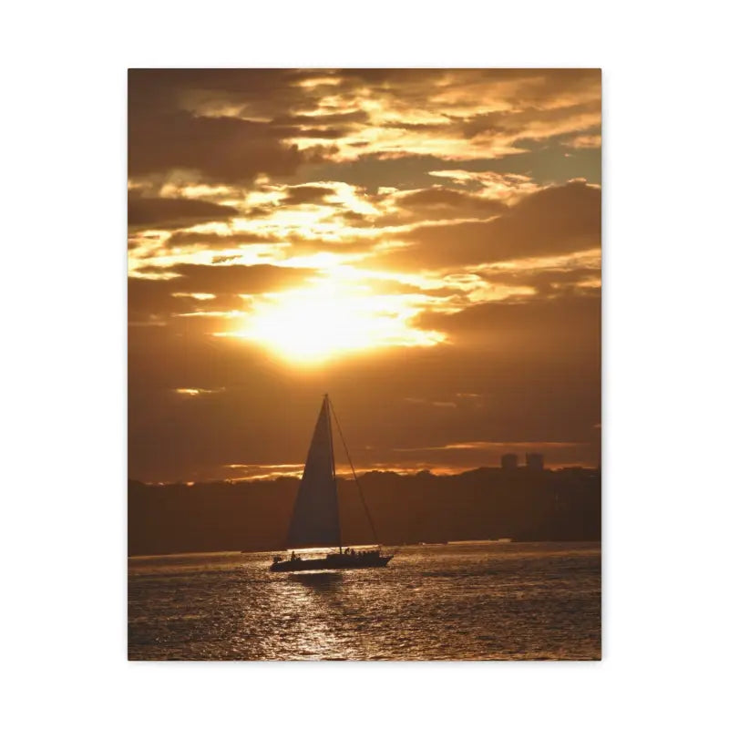 Sailboat silhouetted against a vibrant sunset in Sunset Sailboat Silhouette