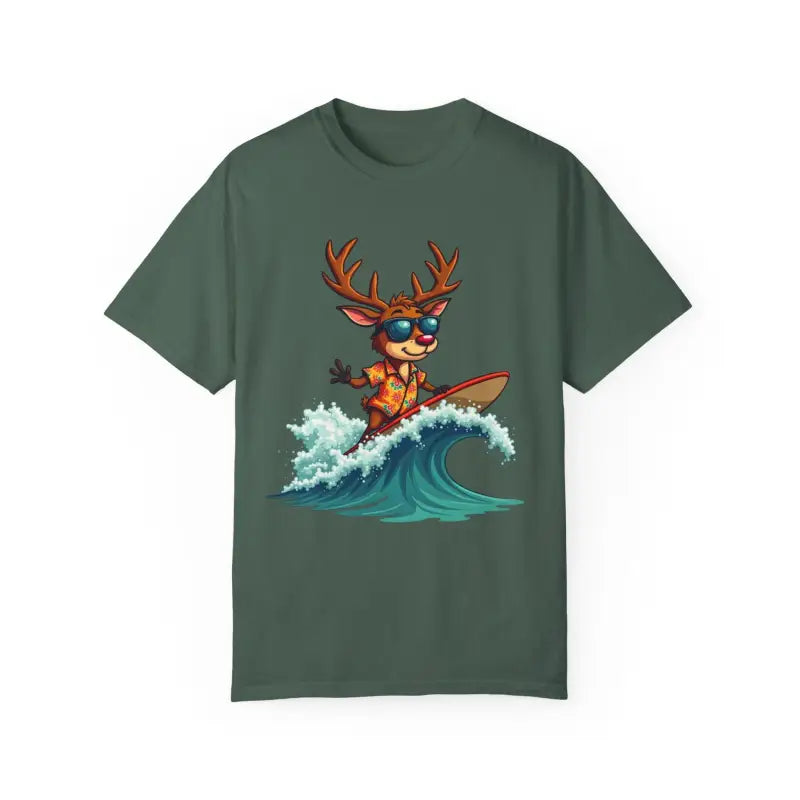 Green t-shirt featuring a surfing reindeer design, ideal for beach enthusiasts