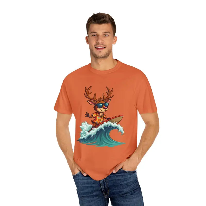 Orange Surfing Reindeer T Shirt featuring a graphic of a surfing deer design