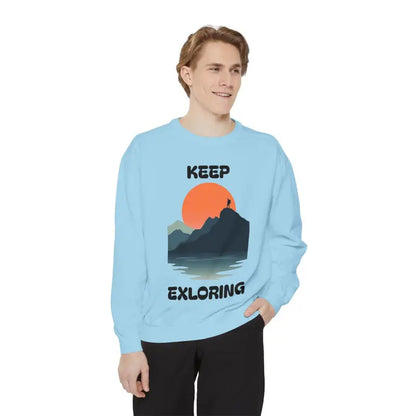 Light blue sweatshirt featuring mountain graphic from Unisex Garment Dyed collection
