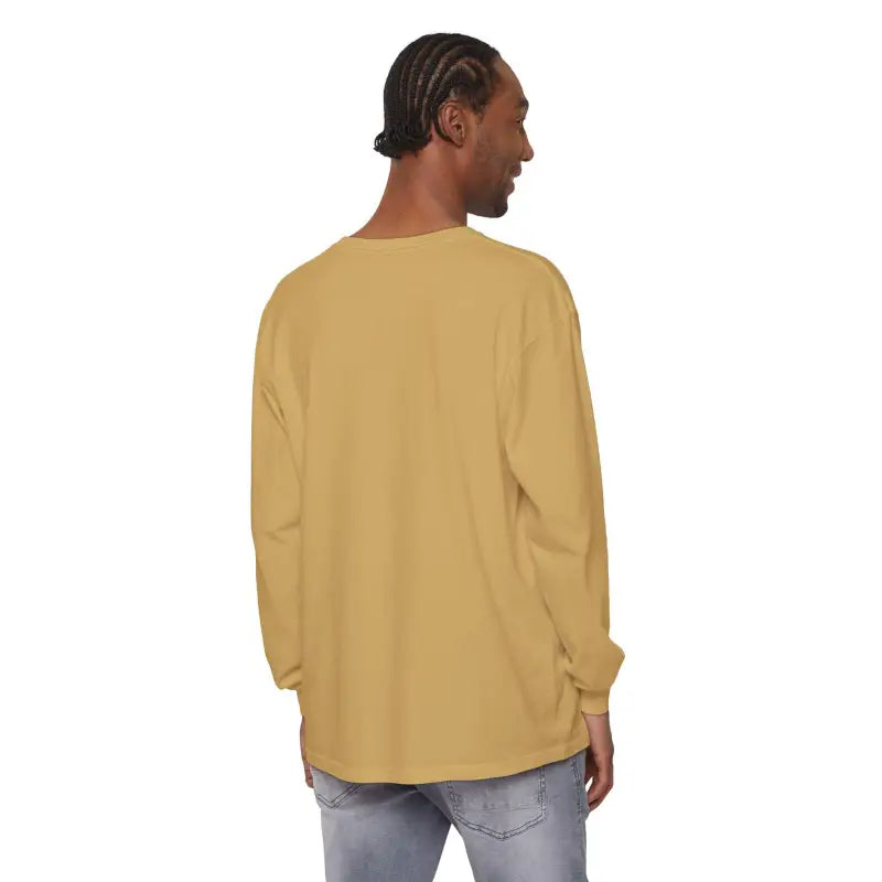Man wearing Unisex Sailboat Graphic Long Sleeve Shirt in a stylish setting