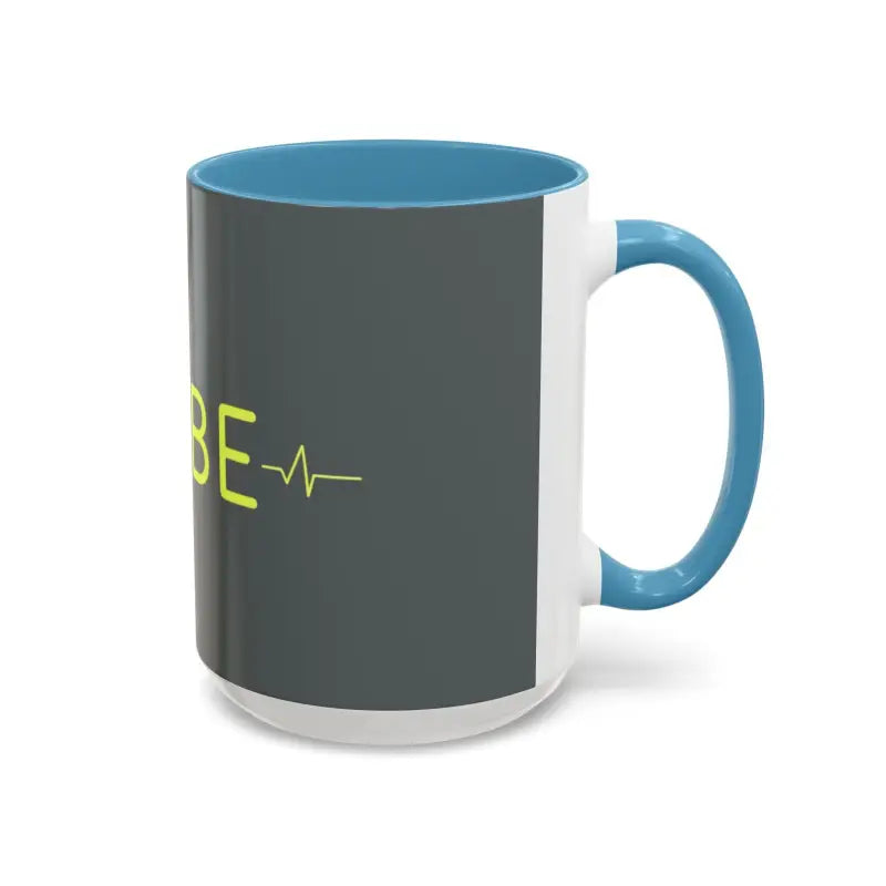 Two-tone Vibe Coffee Mug featuring heartbeat graphic in pink and blue interiors