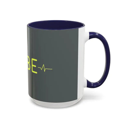 Two-tone Vibe Coffee Mug with heartbeat graphic in pink and blue interiors