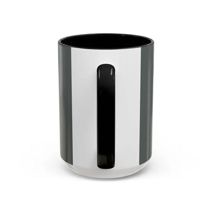 Black and white mug with handle from the Vibe Coffee Mug featuring pink and blue interiors