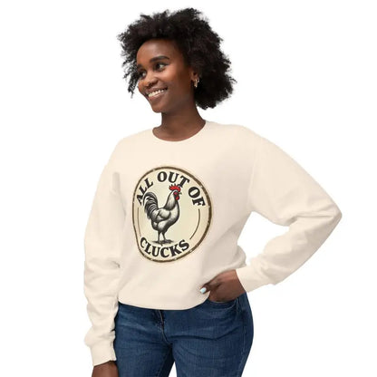 Cream-colored sweatshirt featuring a chicken graphic, labeled White All Out of Clucks