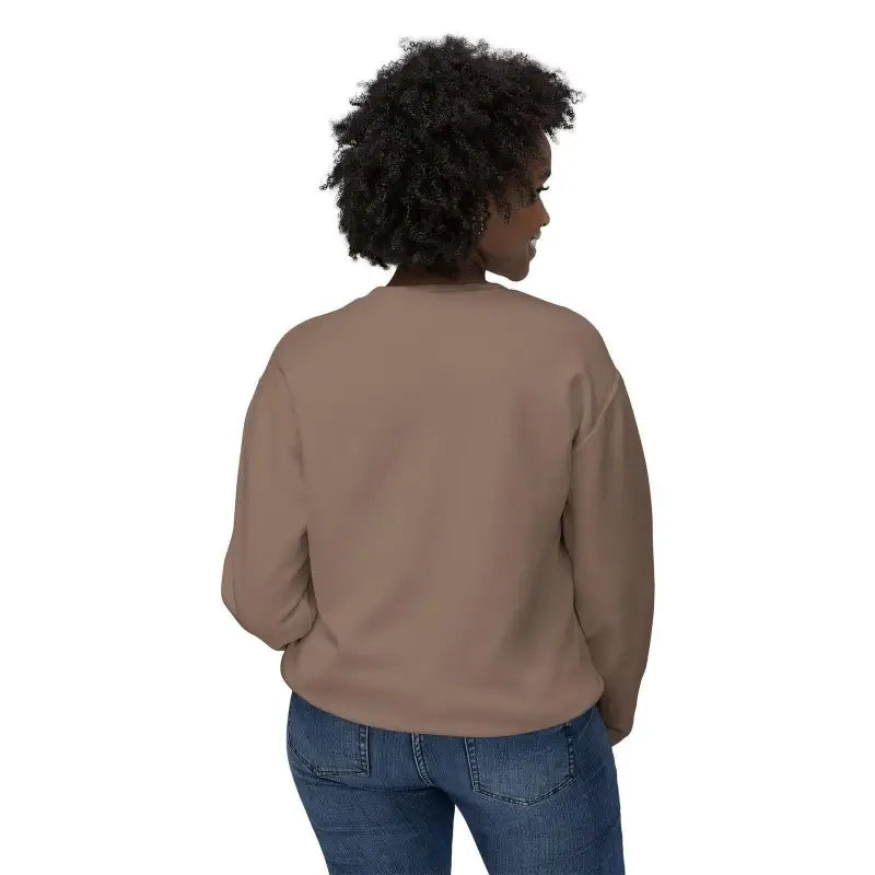 Woman modeling a White All Out of Clucks Crewneck Sweatshirt with brown sweatshirt and blue jeans