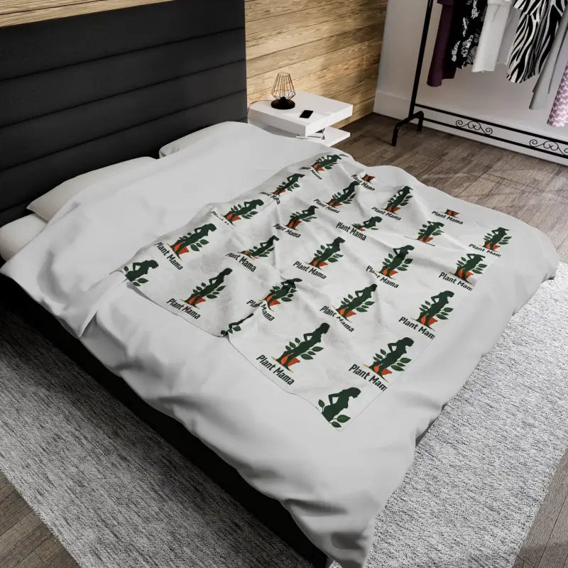 White Velveteen Plush Blanket with Plant Mama Pattern displayed elegantly