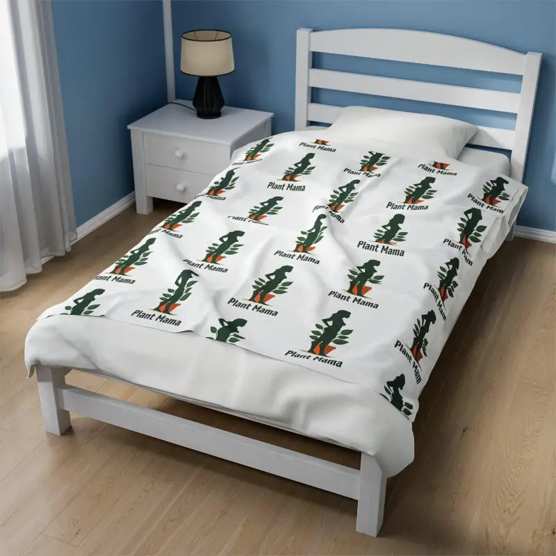 Twin bed adorned with White Velveteen Plush Blanket featuring Plant Mama pattern
