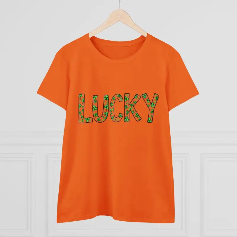 Orange t-shirt featuring a Lucky shamrock design for Women on St Patrick’s Day